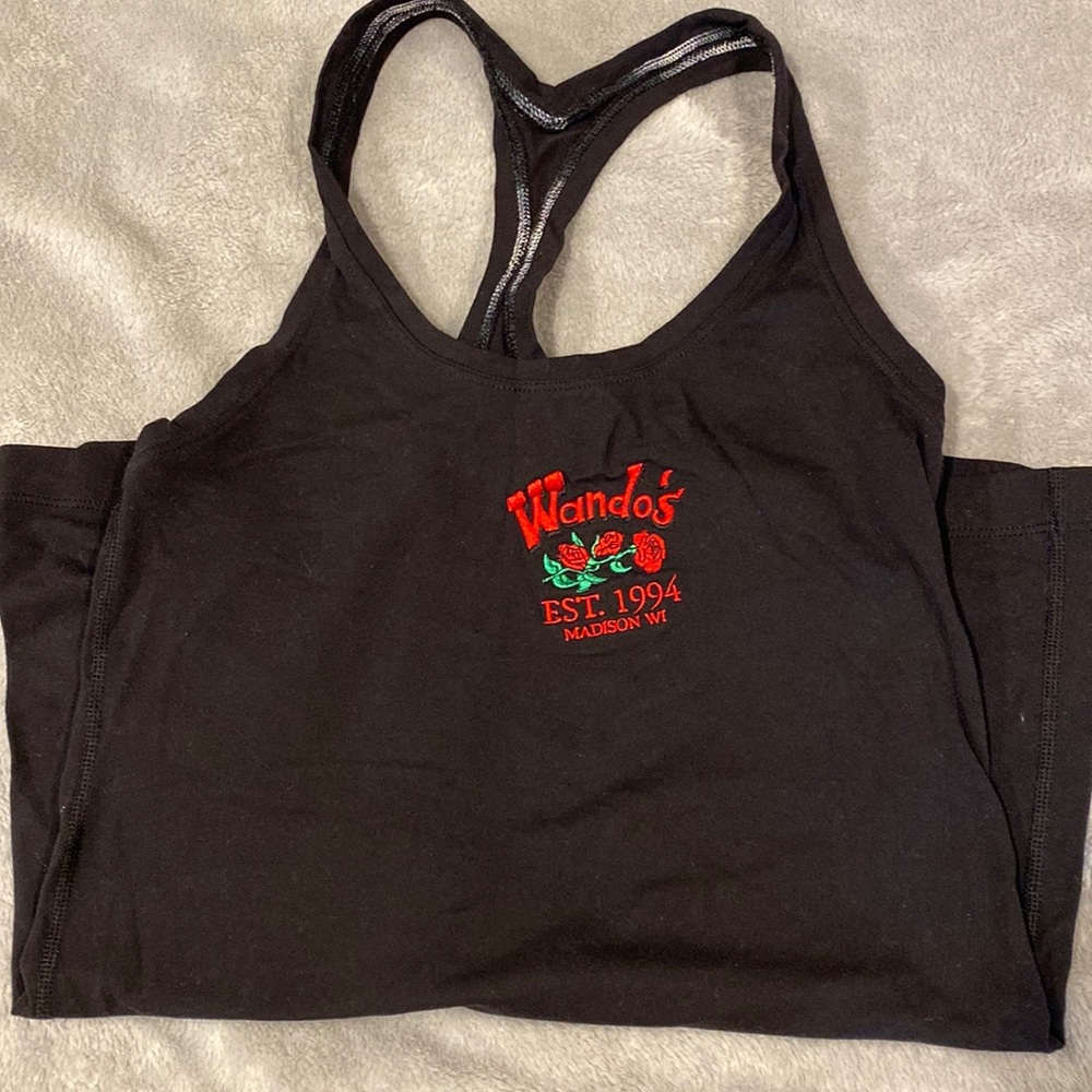 Lululemon racer back compression top with embroidered Wanda’s logo on the front